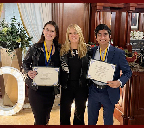 2002 The Valedictorian and Salutatorian with Their Teacher