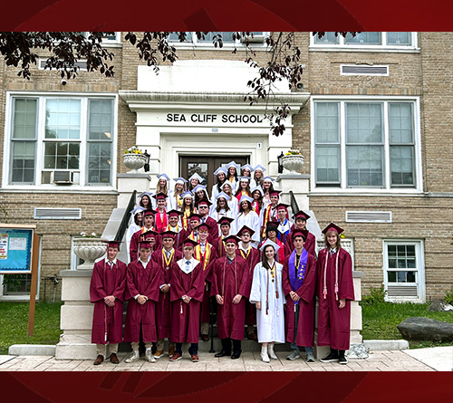 Students in group in gowns and caps