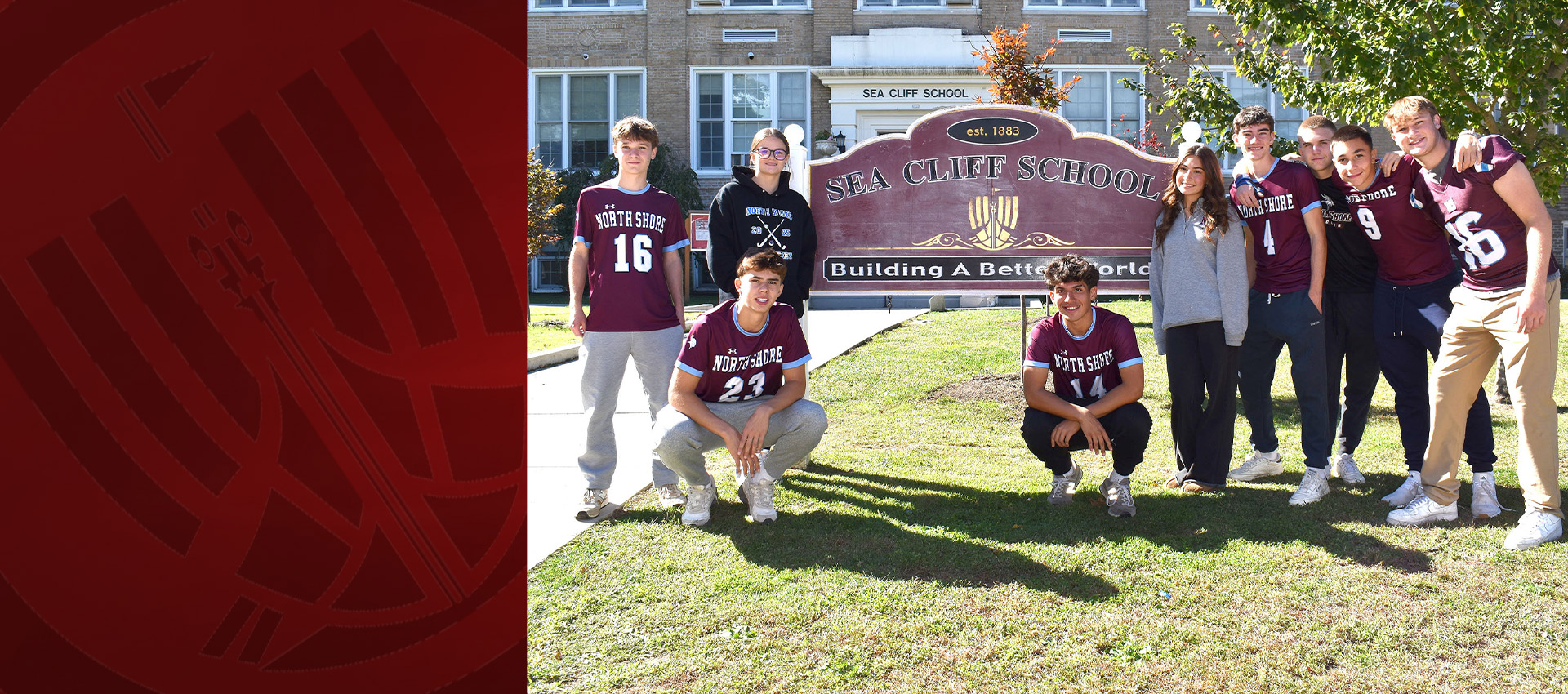 Group of student athletes and cheerleaders posing by the Glenwood Landing School sign